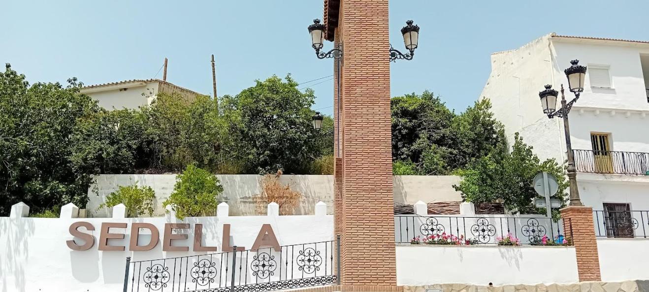 Posada Puente Romano Sedella Buitenkant foto